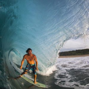 The perfect harmony between a man and the waves.