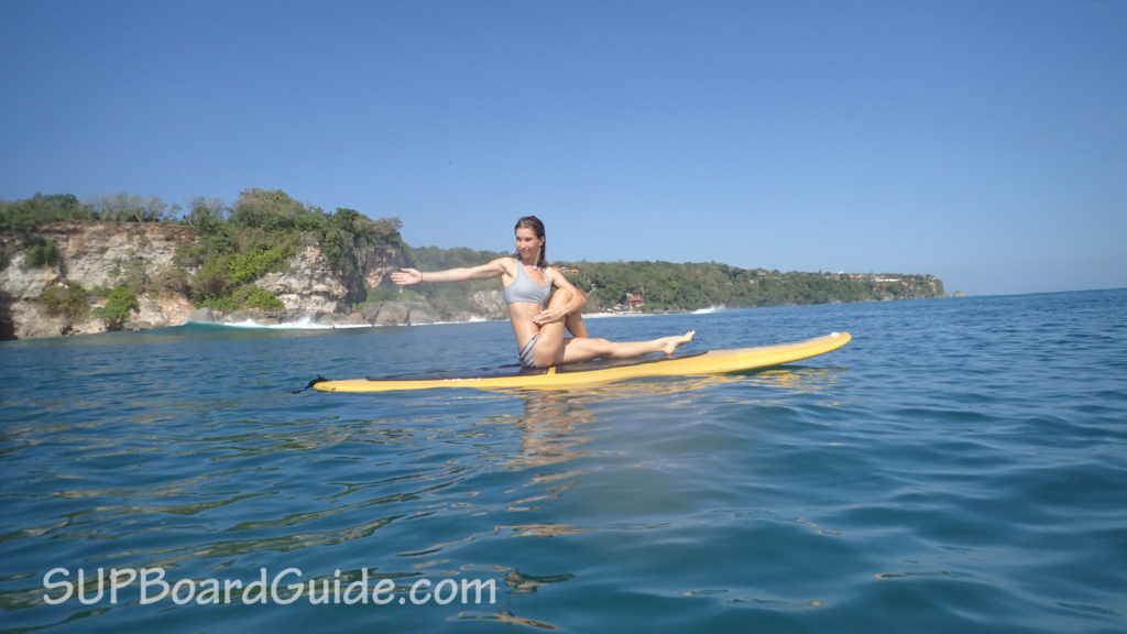 Sarah on her SUP practicing yoga