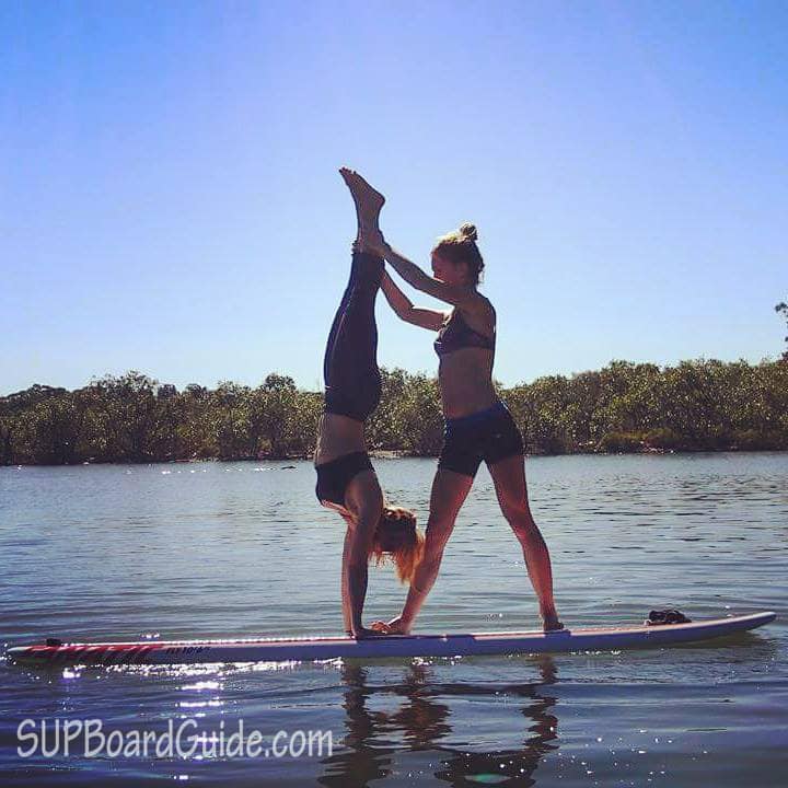 Handstand on a paddle board