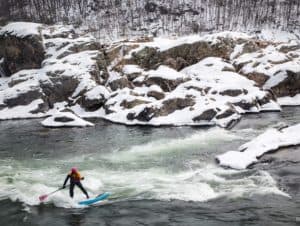 Apparently, summer isn't the only time you can ride with your SUP.