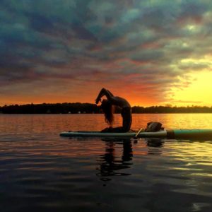 Another SUP Yoga practitioner doing her morning routine.