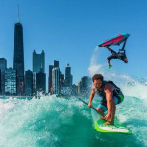 This picture is a utter example of a perfectly timed photograph. In addition to the picturesque moment, the Chicago skyline fits well. Overall, this is just an awesome photo.