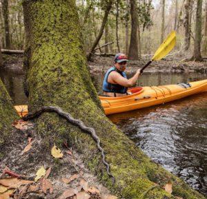 Paddlers encounter a lot of stuff in the river. Fortunately for this man, a snake was too close for comfort. 
