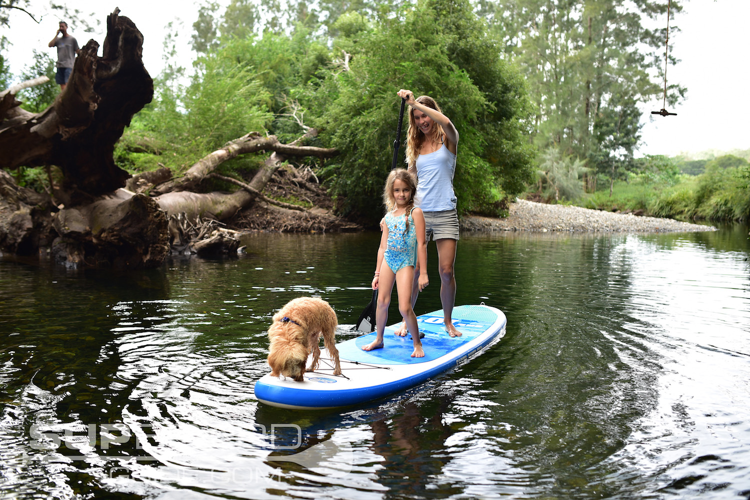 Dog, Girl and Woman on SUP