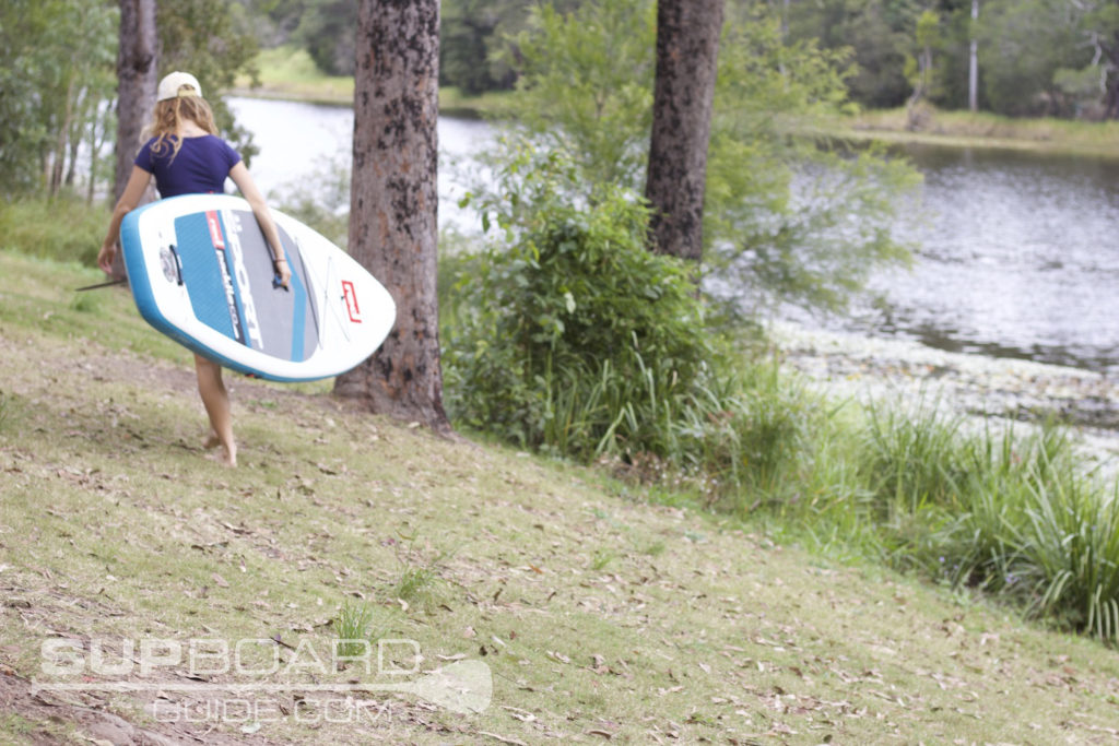 Taking Paddle Board To Water