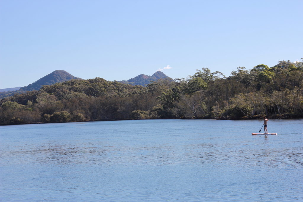 Calm river paddling on inflatable SUP