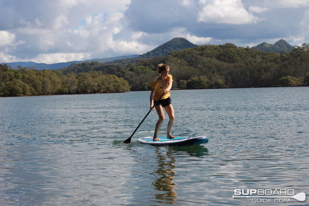 Paddling SUP down river